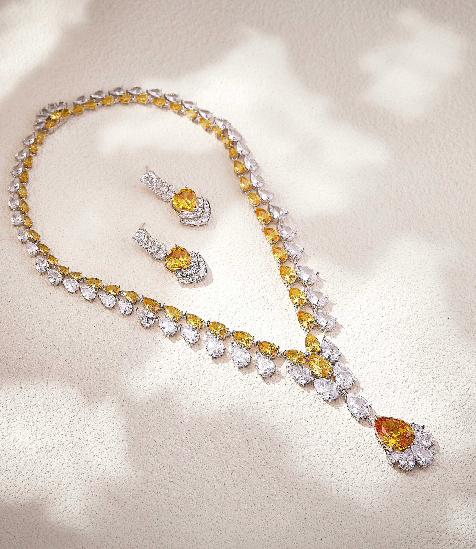 IMG_7297 Large Teardrop Pink and Yellow Diamond Necklace and Earrings - Image 1