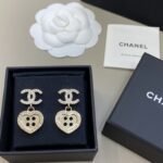 Chanel 25A heart button earrings