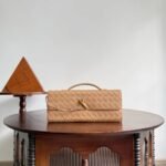 Long stylish woven clutch