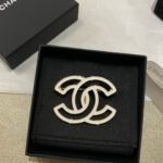 Chanel hollow enamel brooch